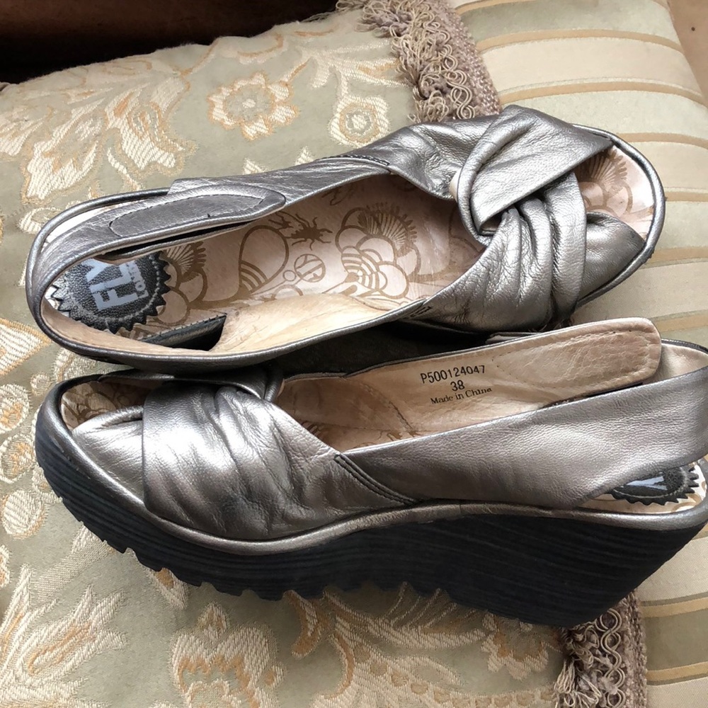 Fly London size 38  Metallic silver.